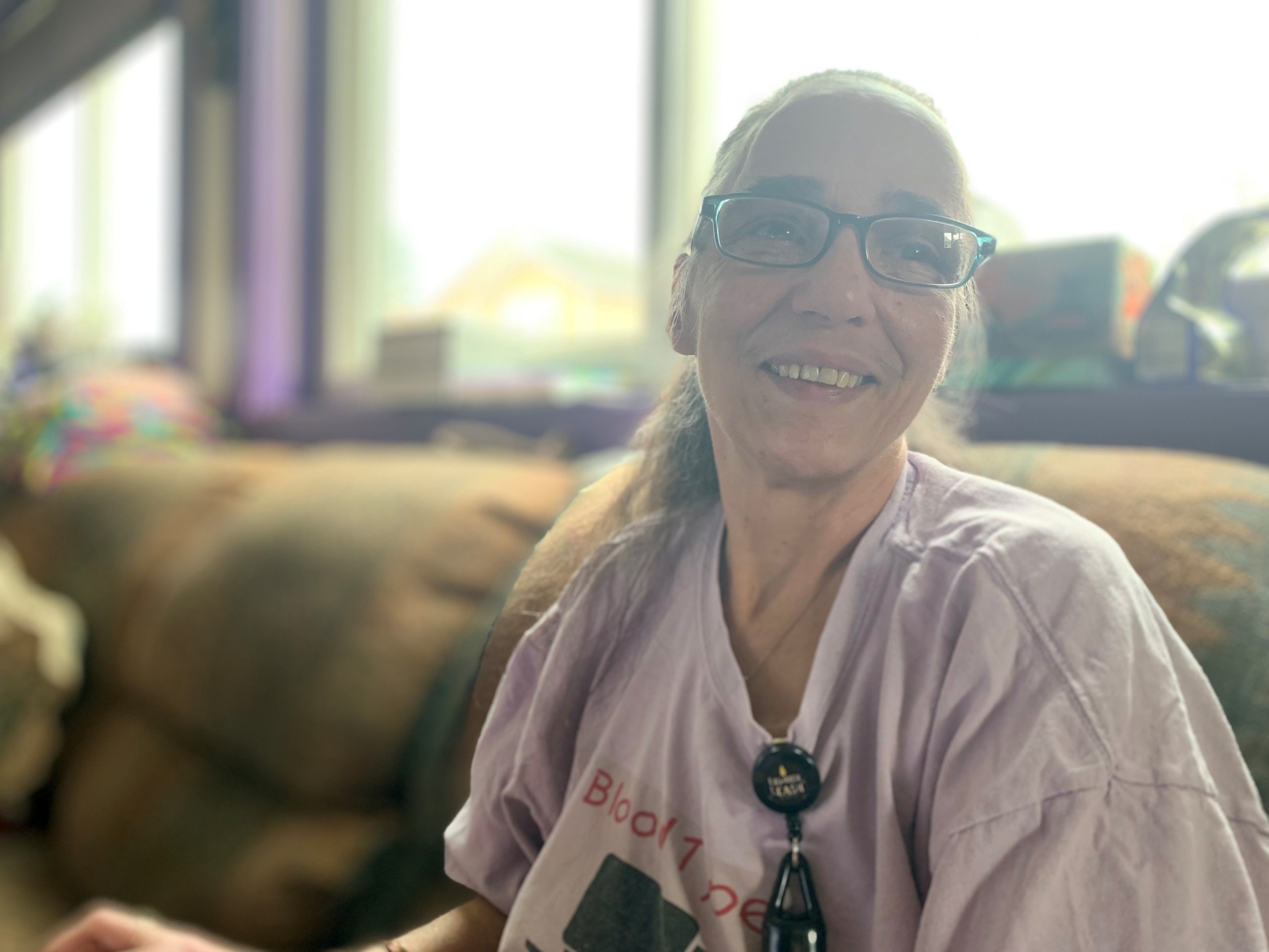 Habitat Homeowner Colise smiles in her living room